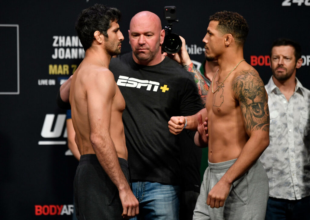 Beneil Dariush and opponent face off at UFC weigh-in showing focus and determination Wallpaper