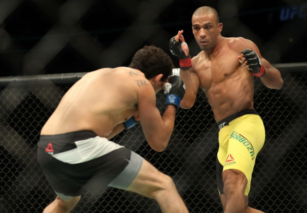 Beneil Dariush and Edson Barboza intense UFC fight stance inside Octagon MMA wallpaper background