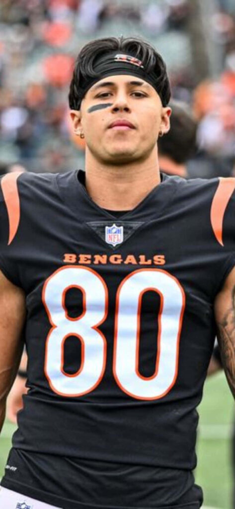 Bengals wide receiver Andrei Iosivas in number 80 jersey standing confidently on the field wallpaper