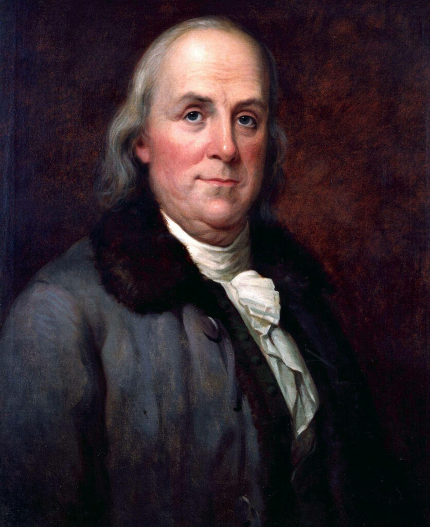 Benjamin Franklin portrait with thoughtful expression dark background classic historical wallpaper