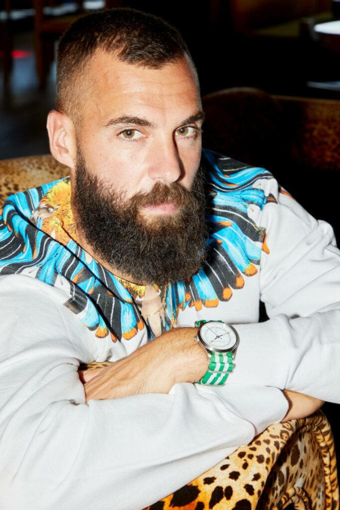 Benoît Paire confident model with beard patterned sweatshirt and stylish watch fashion wallpaper