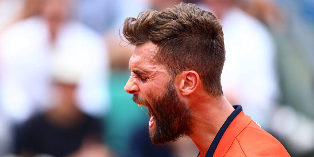 Benoît Paire intense focus tennis match action on court sports wallpaper background