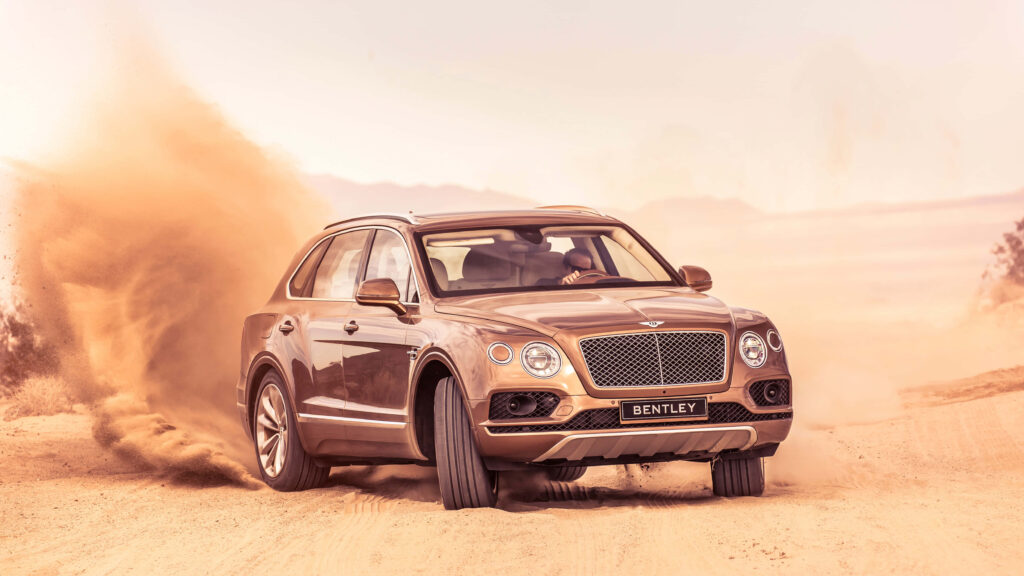 Road with the Exquisite Bentley Bentayga - A Perfect Blend of Power, Prestige, and Opulence Wallpaper