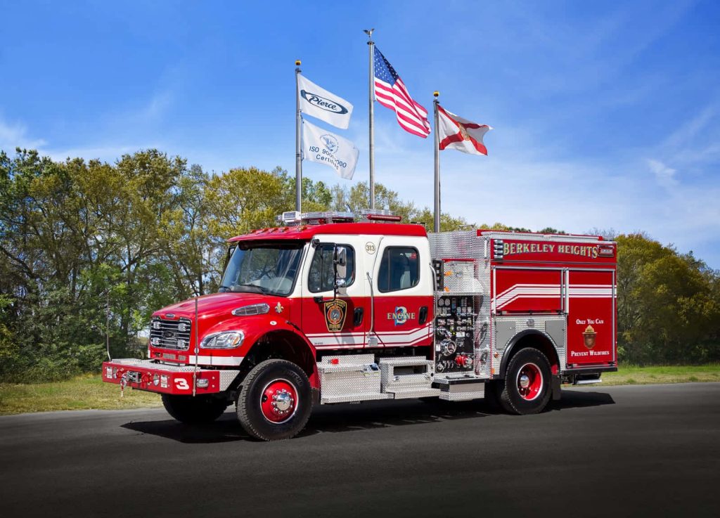 Berkeley Heights Engine 3 fire truck with Smokey Bear and flags under blue sky wallpaper background