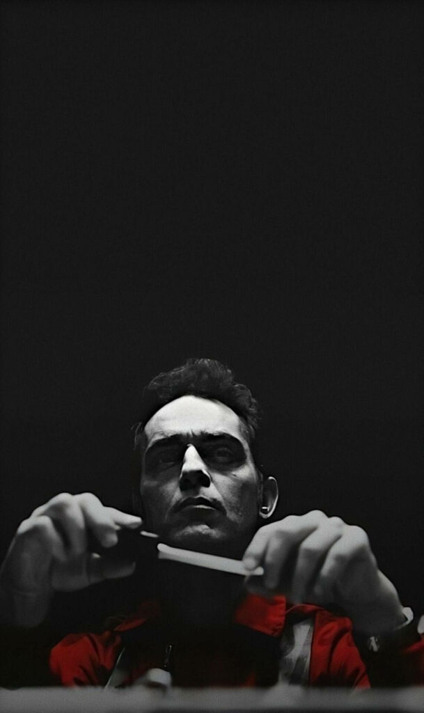 Dramatic Berlin Heist: Intense Shadows and Suspenseful Intrigue in Noir Setting Wallpaper