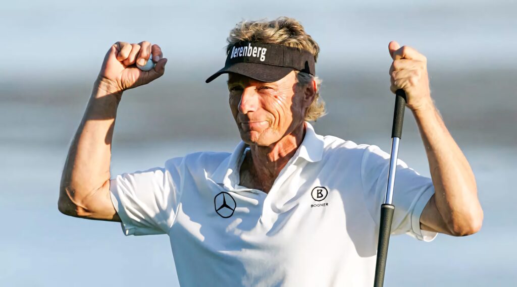 Bernhard Langer celebrating confidently on golf course vibrant wallpaper background