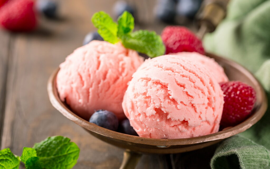 Berrylicious Delight: A Tempting Raspberry Ice Cream Dream! Wallpaper