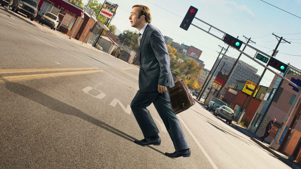 Saul Goodman walking determinedly on empty street Better Call Saul wallpaper for justice pursuit