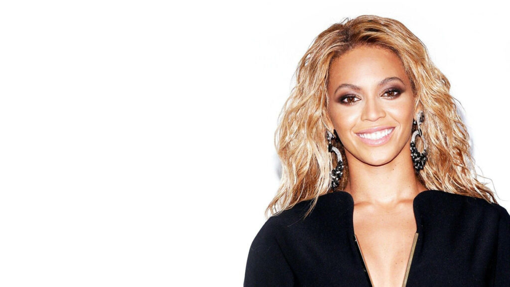 Radiant Beyoncé Wallpaper: Elegant Background Celebrating Iconic Success