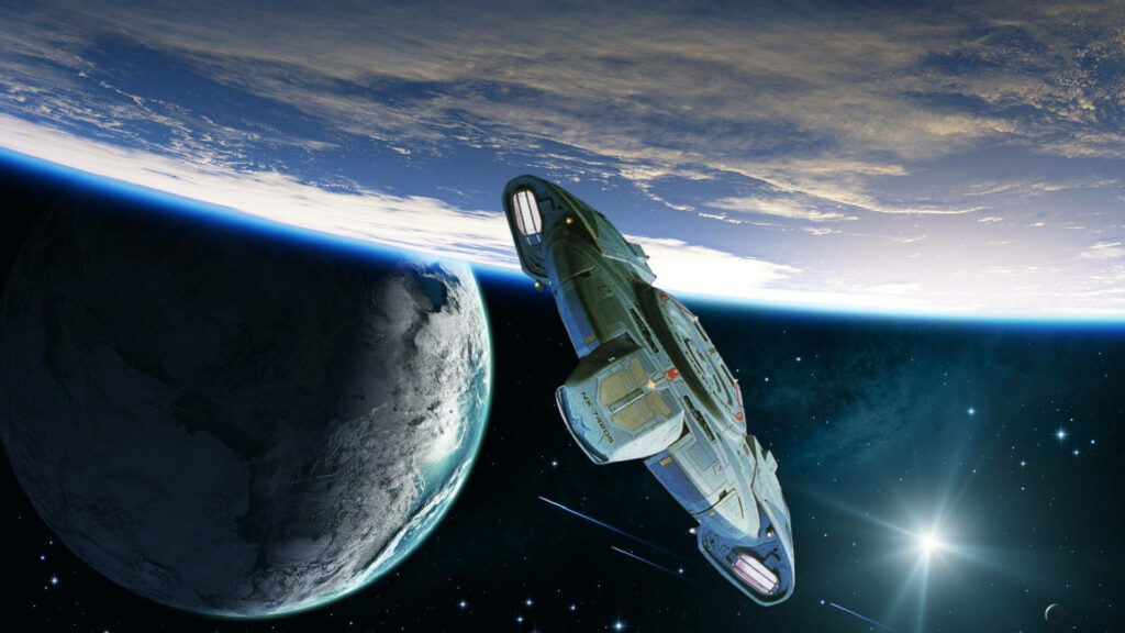 Journey to Uncharted Frontiers: An Intrepid-Class Starship Soaring to Discover the Mysteries of the Cosmos Wallpaper