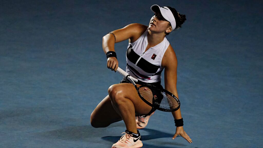 Bianca Andreescu celebrating victory on tennis court displaying determination and competitive spirit Wallpaper