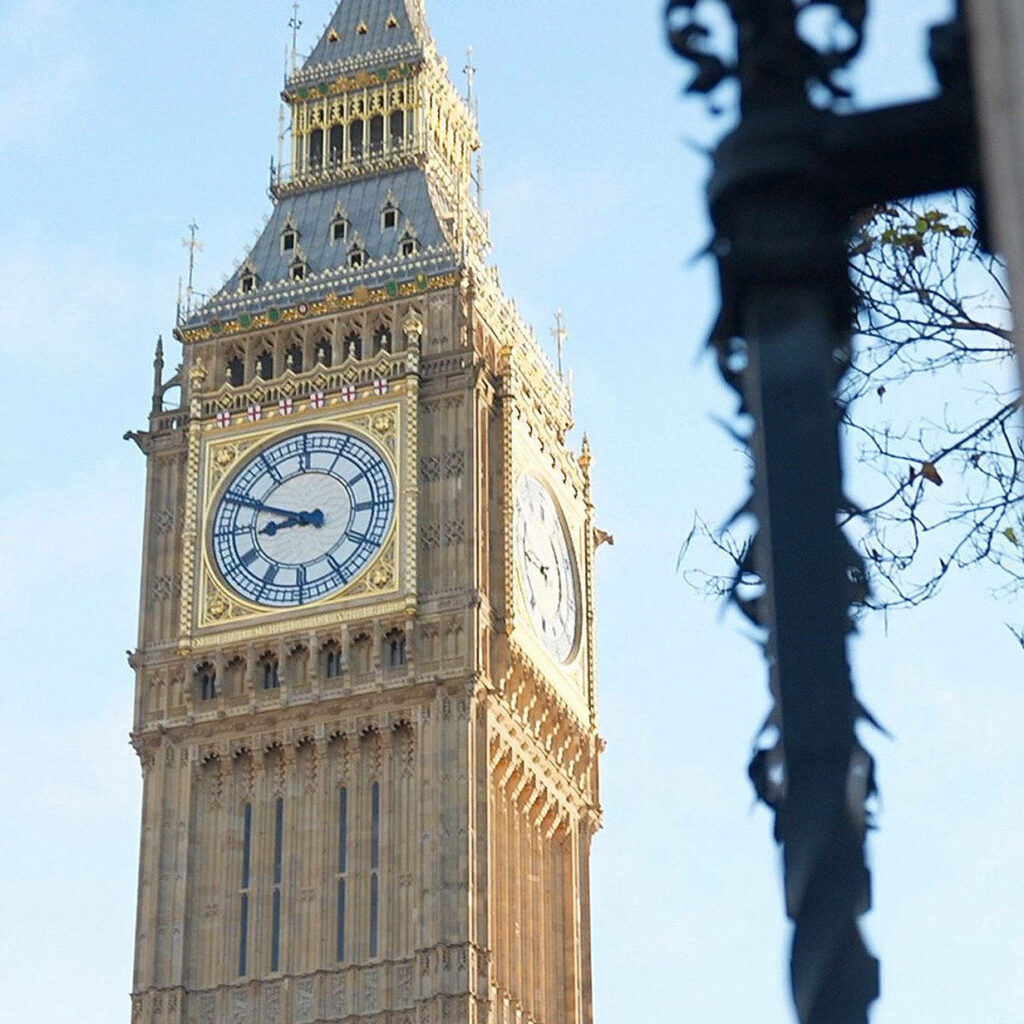 Big Ben clock tower upward view detailed architecture clear blue sky wallpaper background