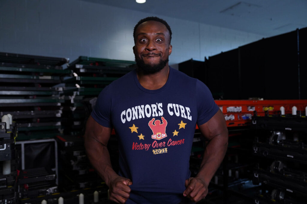Big E wearing Connors Cure Victory Over Cancer 2021 t-shirt backstage showing support for cancer awareness Wallpaper