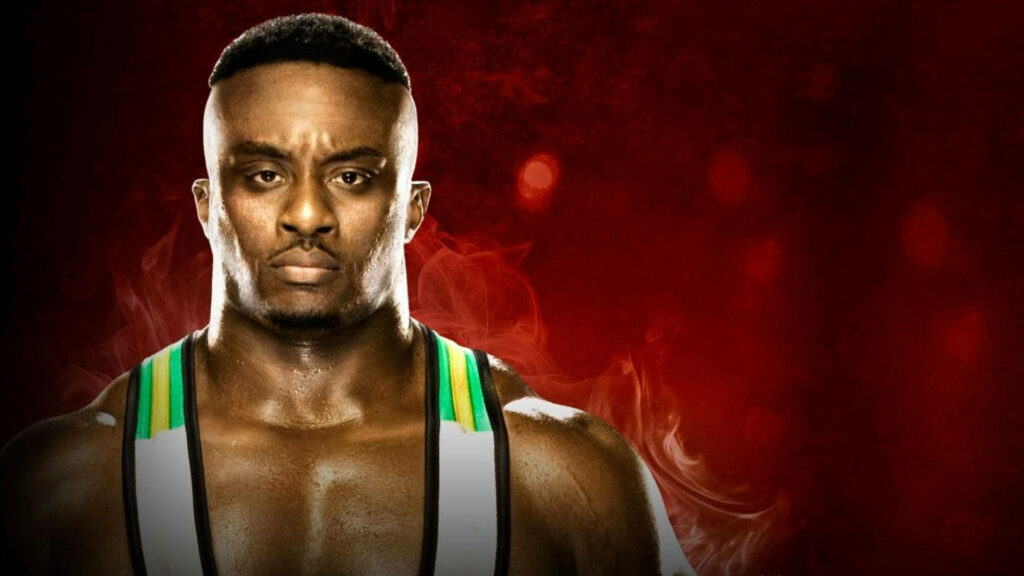 Big E close-up fierce gaze intense formidable presence deep red wallpaper background wrestling