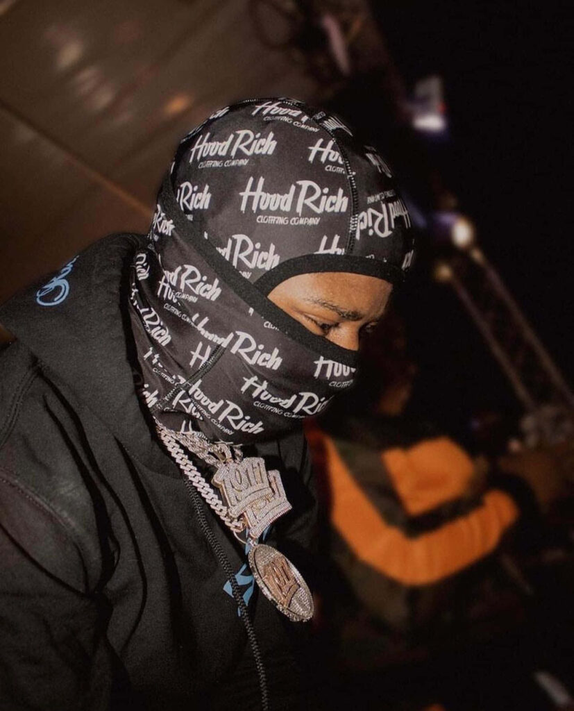 Big Scarr wearing Hood Rich balaclava and heavy chains showcasing bold rapper style wallpaper
