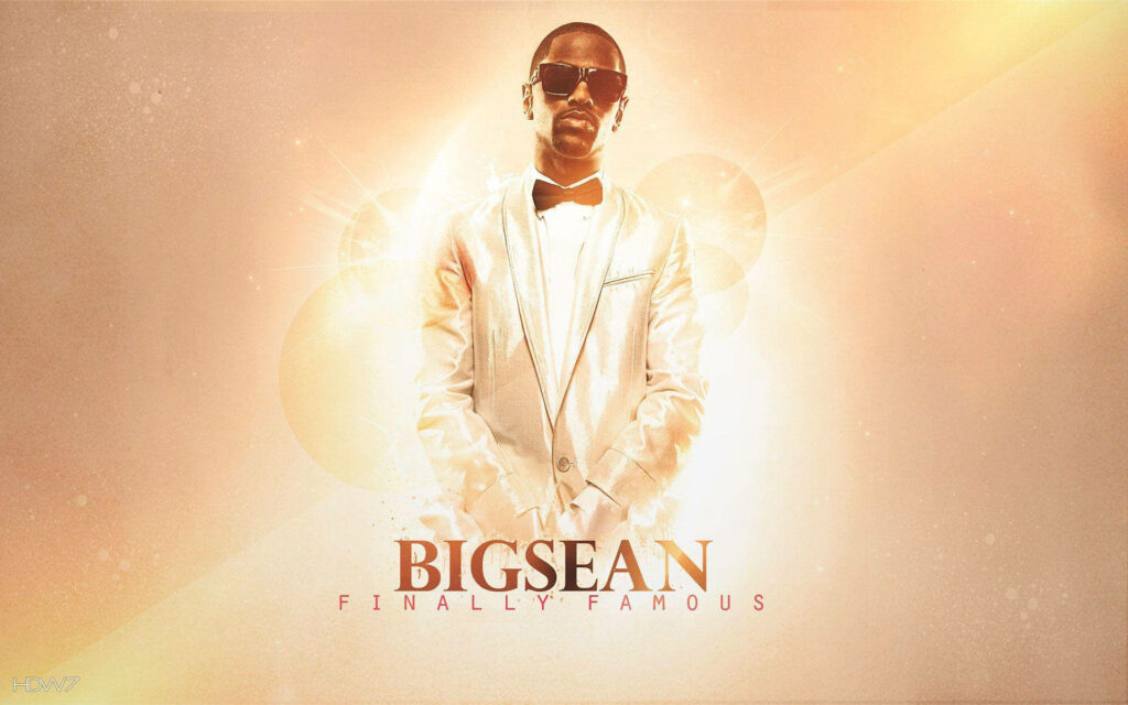 Big Sean in white suit sunglasses glowing background Big Sean Finally Famous album wallpaper