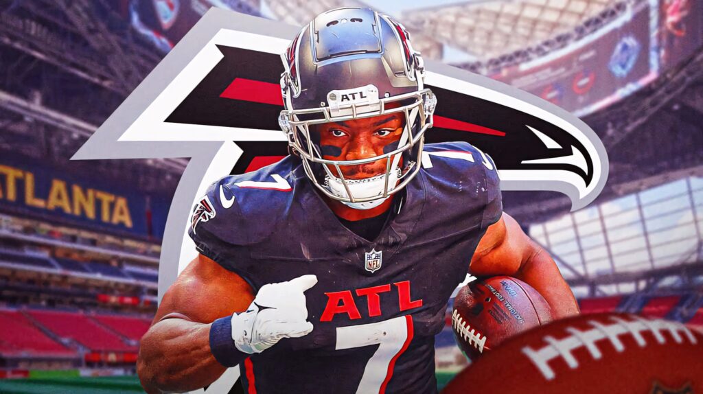 Bijan Robinson Atlanta Falcons running dynamic play on field with vibrant stadium background Wallpaper