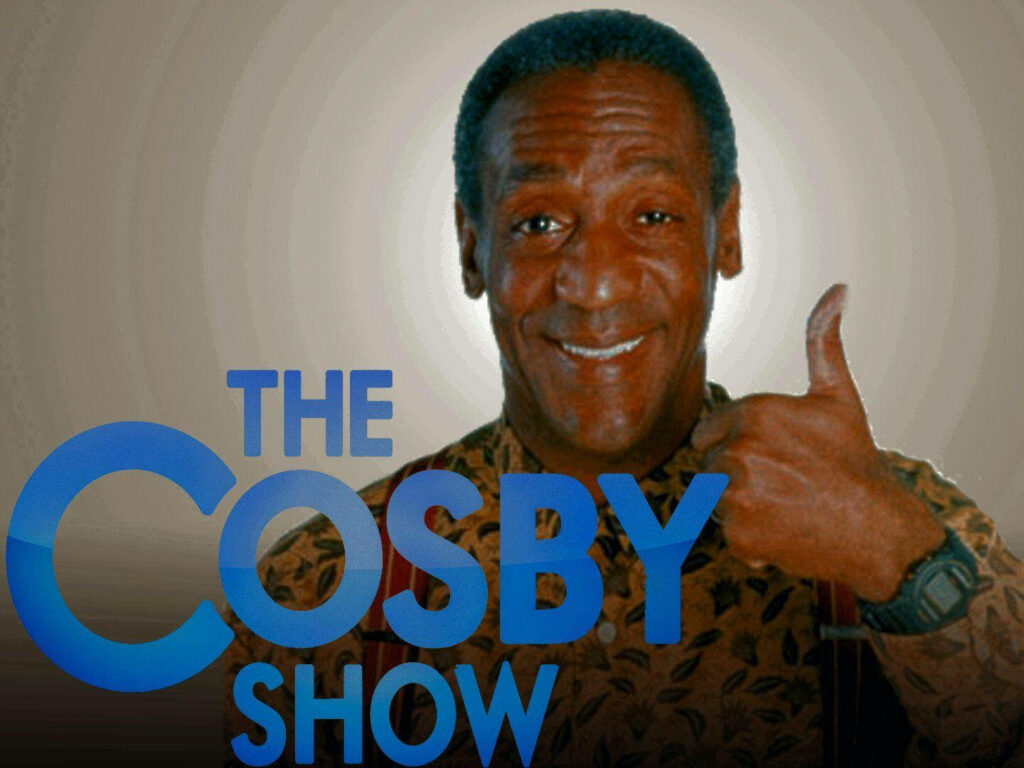 Bill Cosby smiling and giving thumbs up classic wallpaper from The Cosby Show iconic sitcom background