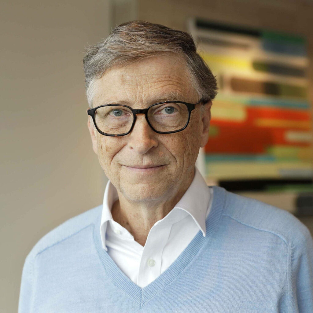 High-resolution Bill Gates wallpaper calm focused expression softly blurred background