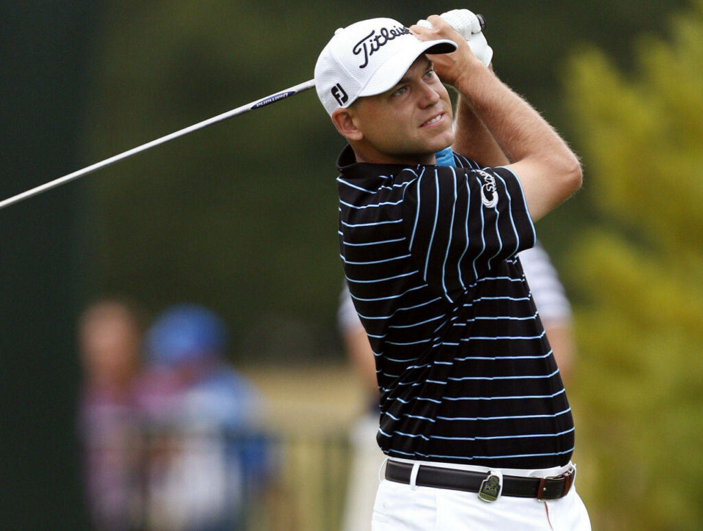 Bill Haas confident golf shot smile on course dynamic wallpaper showcasing focus and enjoyment