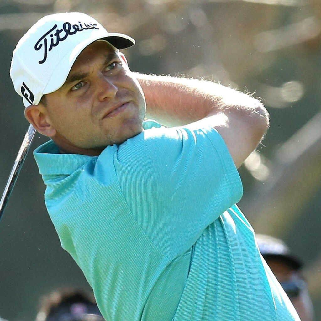 Bill Haas focused golf swing competitive game dynamic wallpaper background sports action