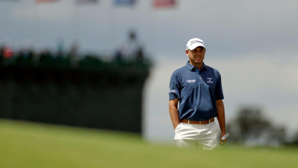 Bill Haas confident on golf course with scenic backdrop natural light professional golfer focus Wallpaper