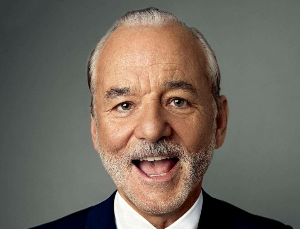 Bill Murray smiling brightly in stylish GQ portrait perfect uplifting wallpaper background