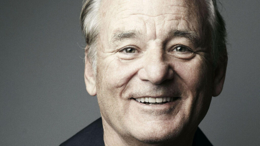 Bill Murray smiling warmly veteran actor portrait wallpaper with simple background
