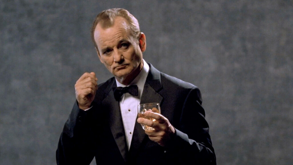 Bill Murray as Bob Harris in tuxedo holding glass iconic Lost In Translation movie scene wallpaper
