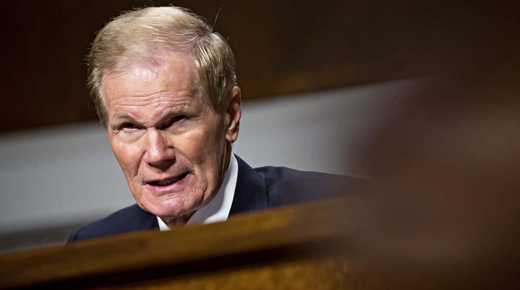 Bill Nelson serious focused determined expression formal setting professional wallpaper background