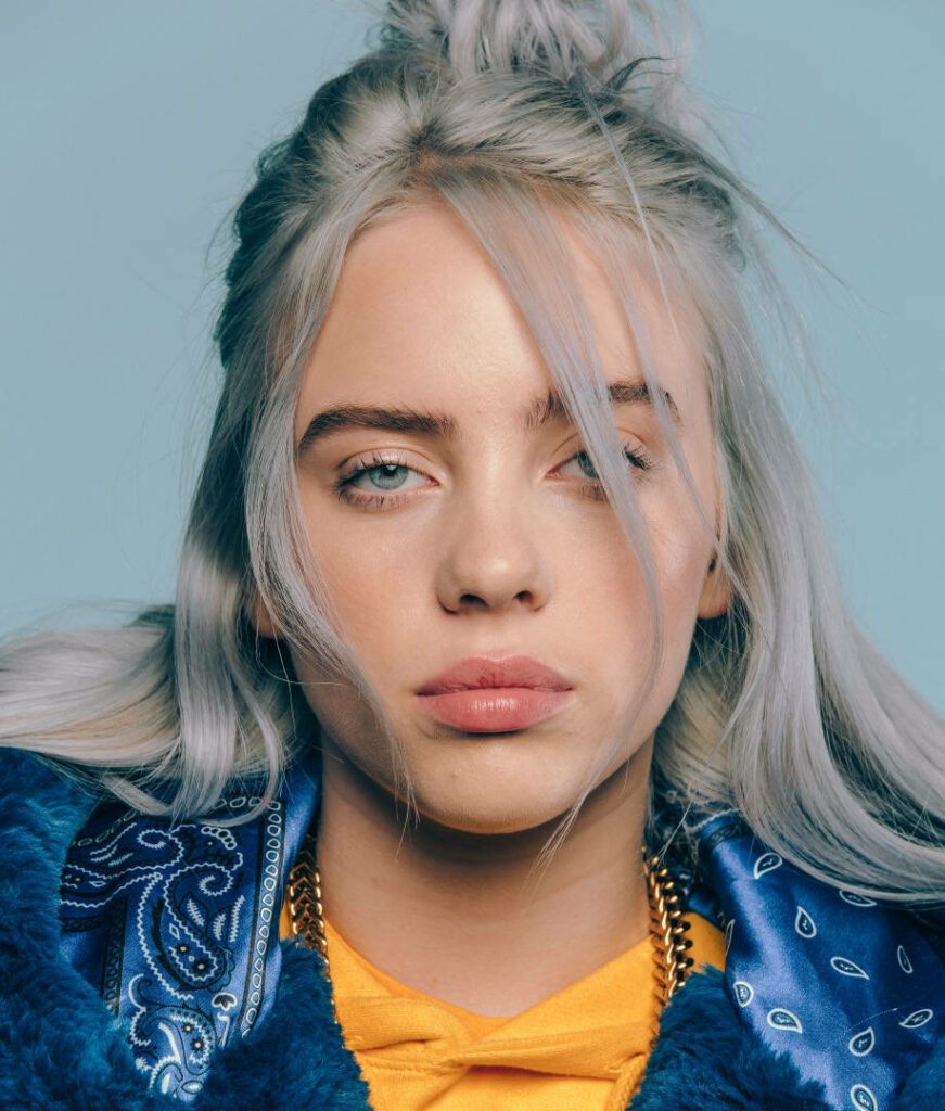 Billie Eilish Portrait: Unique Style & Cool-Toned Wallpaper Background