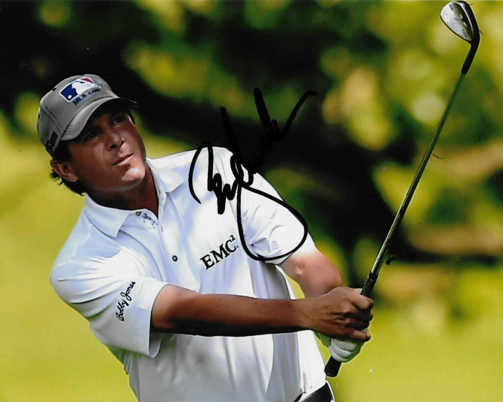 Billy Andrade golf wallpaper showing focused swing and signature autograph on background