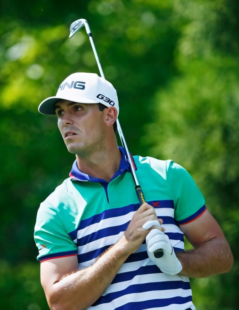 Billy Horschel on golf course holding club on shoulder focused for next shot dynamic wallpaper