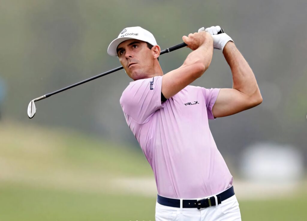 Professional golfer Billy Horschel mid-swing showing focus and athletic skill on golf course Wallpaper