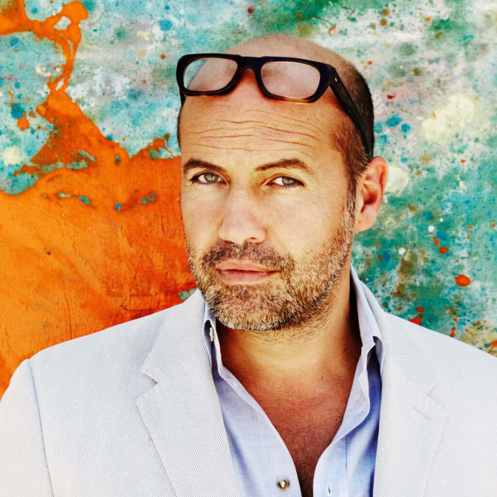 Billy Zane confident pose vibrant colorful abstract background artistic wallpaper image