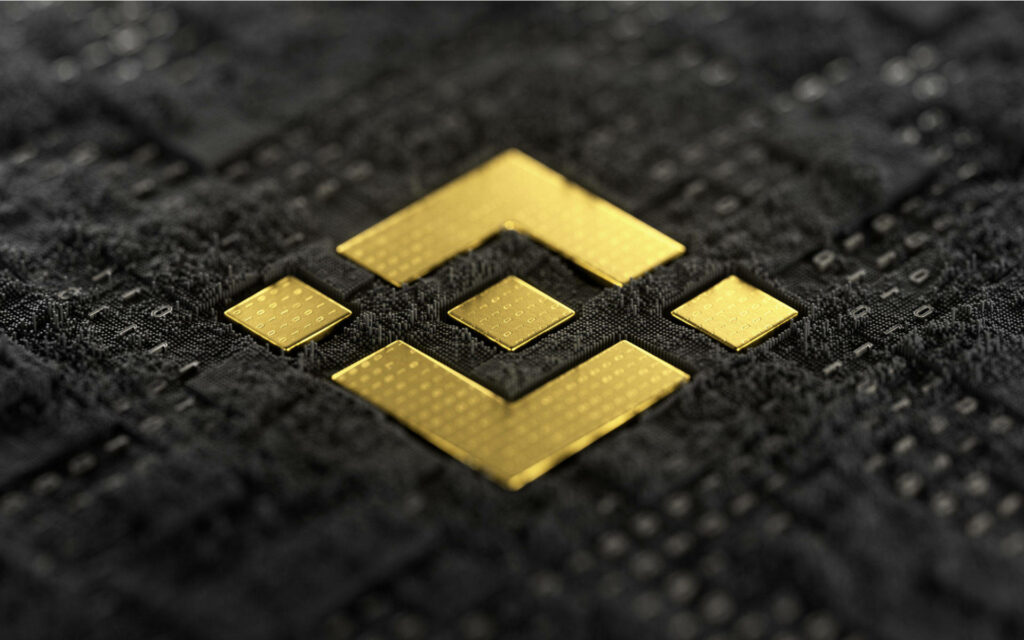 Binance golden metal logo on textured black background sleek modern crypto wallpaper background