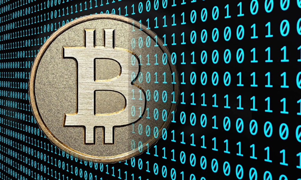 Large Bitcoin coin with glowing blue binary code background symbolizing digital currency power Wallpaper