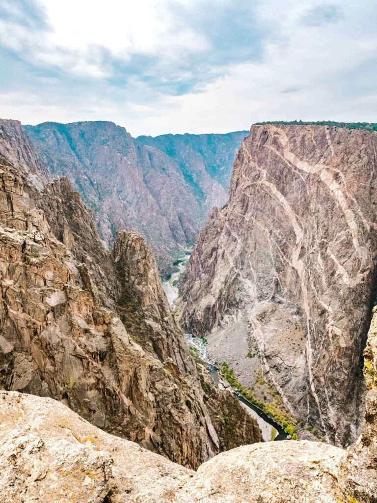 Black Canyon wallpaper with dramatic cliffs rugged landscape and deep winding river view