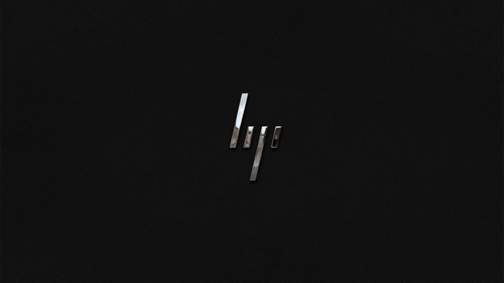 Sleek and Sophisticated: The HP Laptop Emblem Shines on a Luxurious Black Canvas Wallpaper