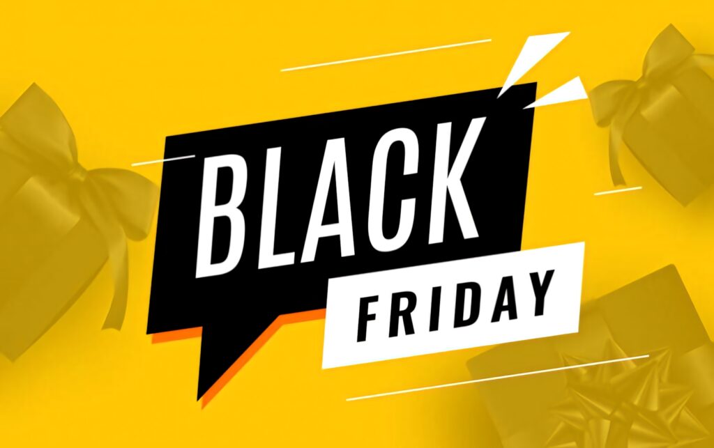Black Friday wallpaper with bold black and white text in speech bubble on vibrant yellow background