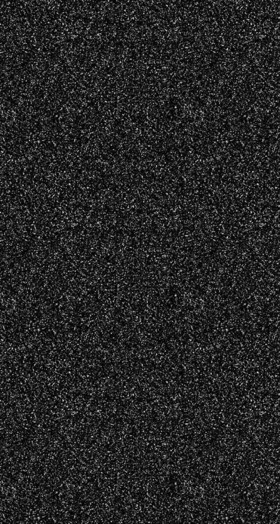 Black glitter wallpaper with shimmering white specks on a rich dark textured background