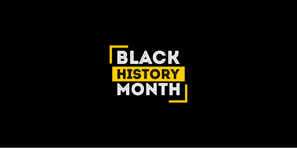 Black History Month banner with bold white and yellow text on sleek black background wallpaper