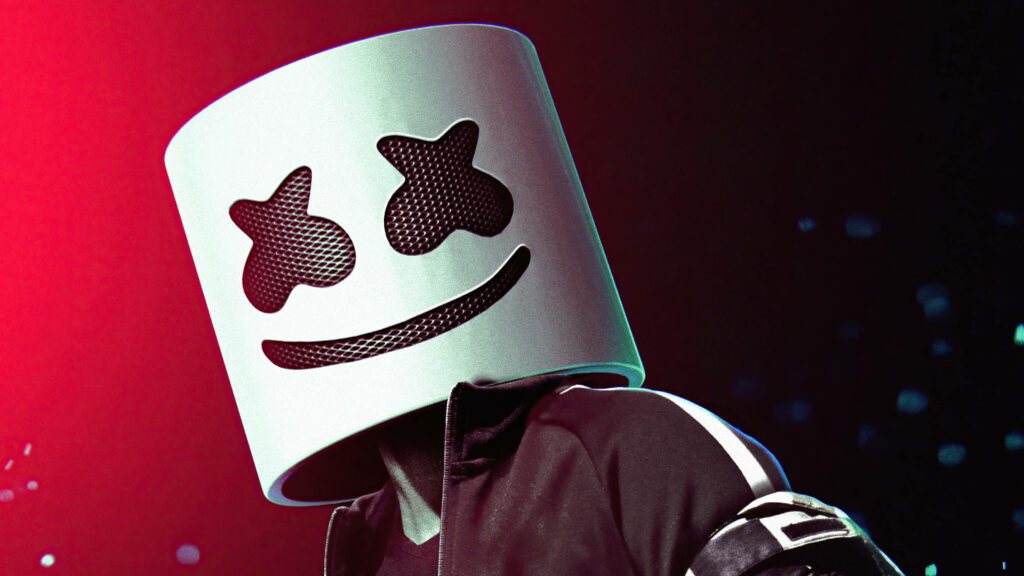 Black Smiles in Red: The Striking Background of DJ Marshmello's Iconic Helmet Wallpaper