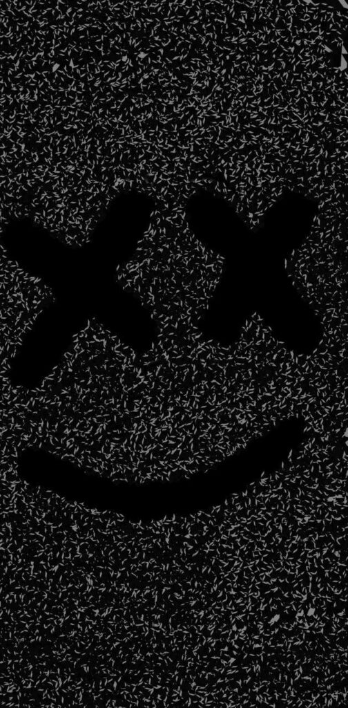 Melodic Monochrome: The Iconic Smiley of Marshmello on a Grainscape Wallpaper