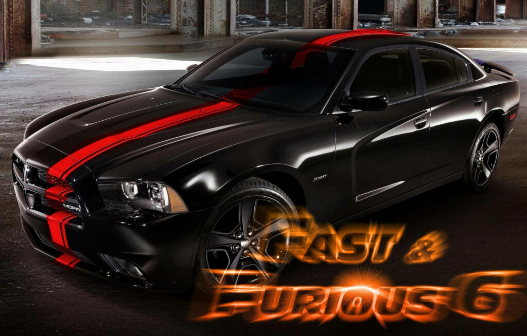 Black muscle car with red racing stripes in urban setting Fast and Furious 6 wallpaper background