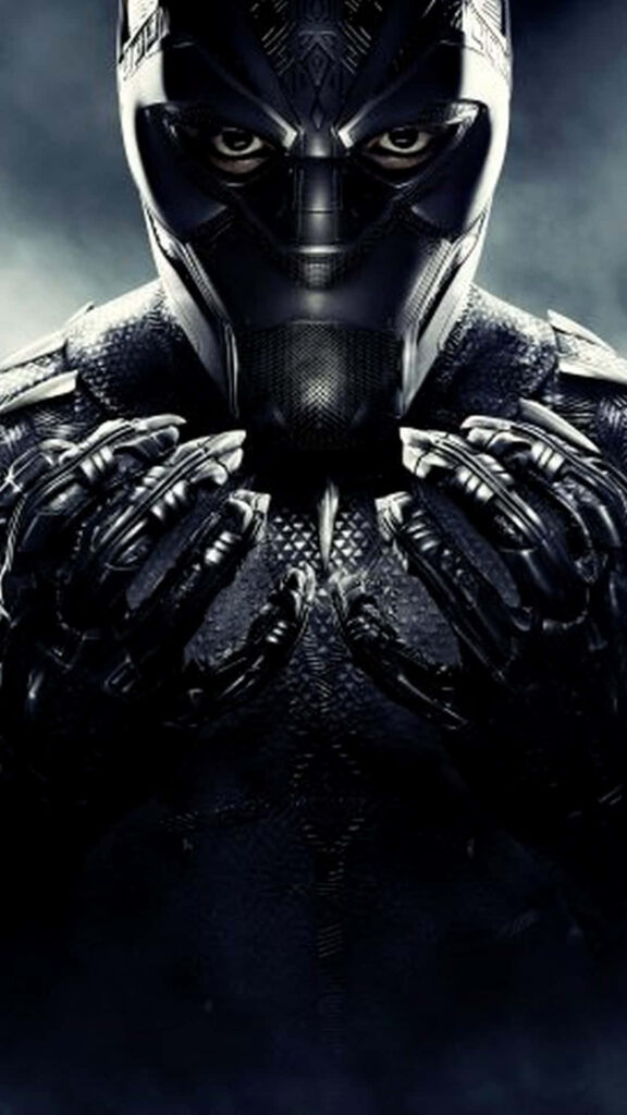 Black Panther in iconic suit showing strength and intensity wallpaper background design
