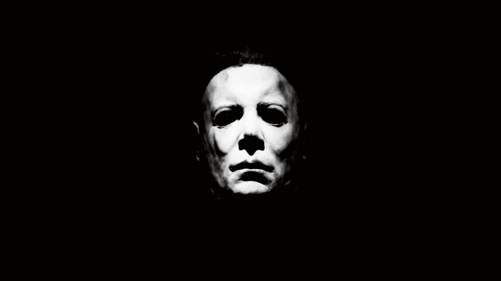 Stalking Shadows: HD Halloween Horror with Michael Myers in Black and White Wallpaper