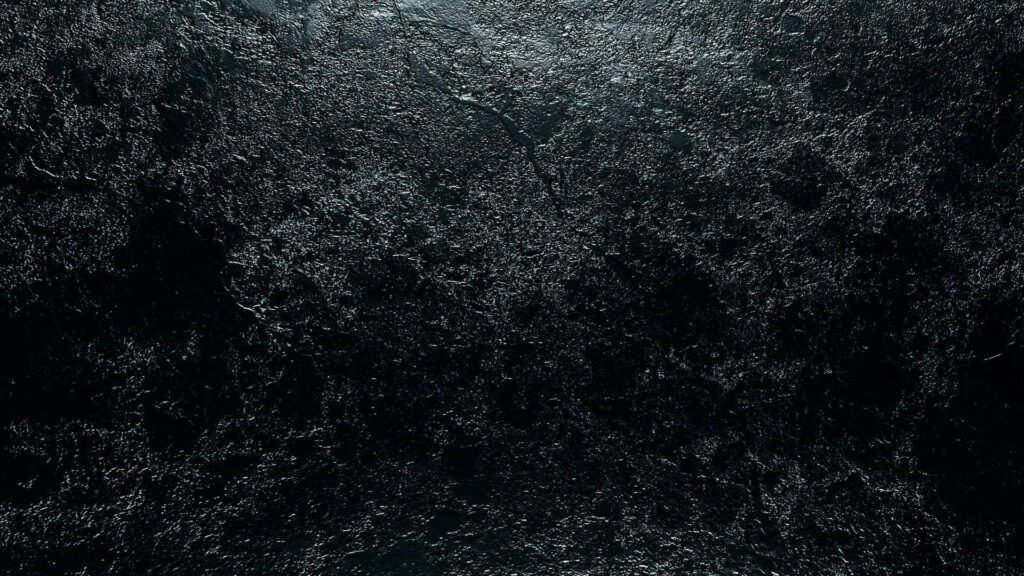 HD black texture wallpaper with sleek glossy surface and deep moody highlights minimalist background