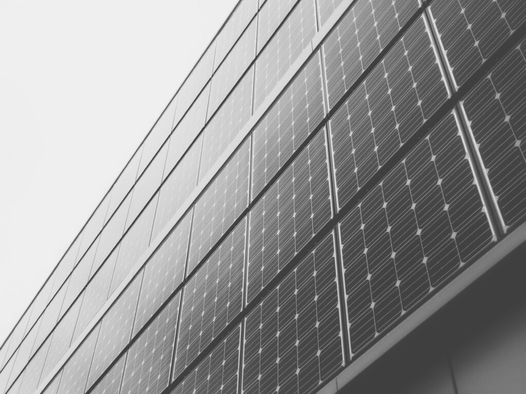 Black & White Solar Panels Wallpaper: Modern Sustainable Energy Design