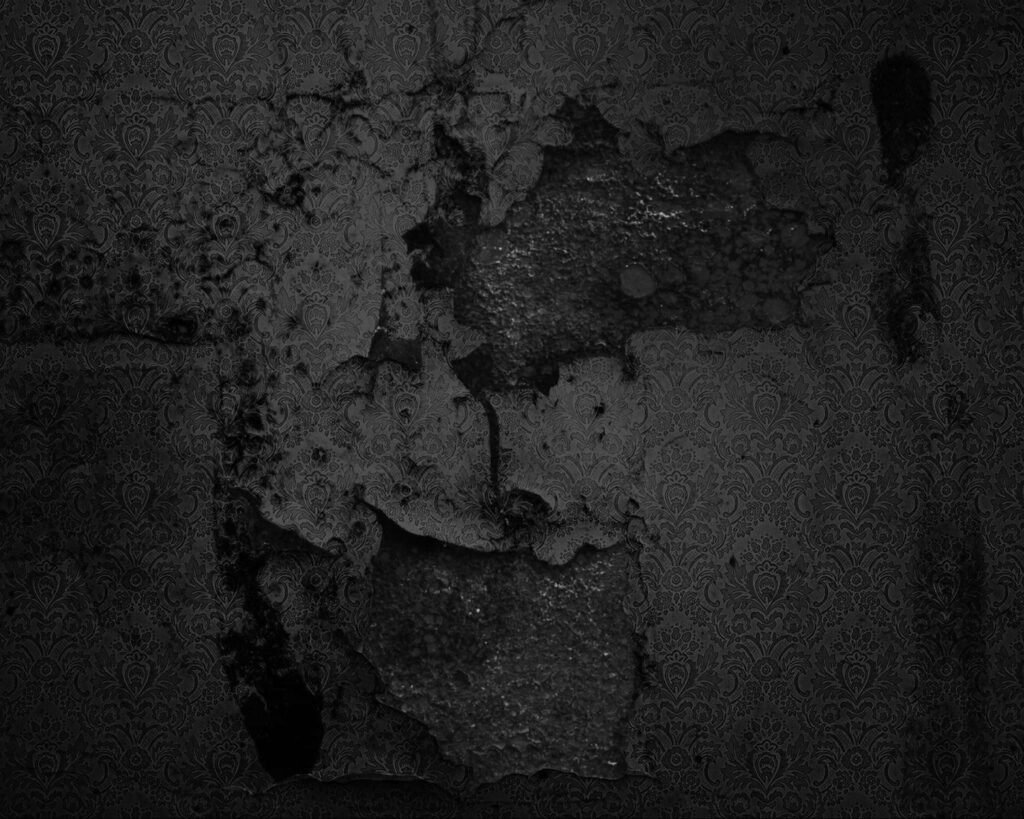 Textured Black and White Wallpaper: Decayed Wall with Intricate Patterns
